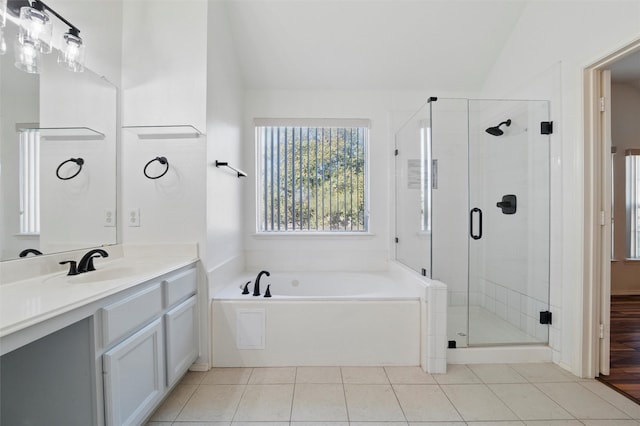 6500 High Brook Dr, Fort Worth, TX 76132 - full bathroom featuring a shower stall, vaulted ceiling, tile patterned flooring, and a bath