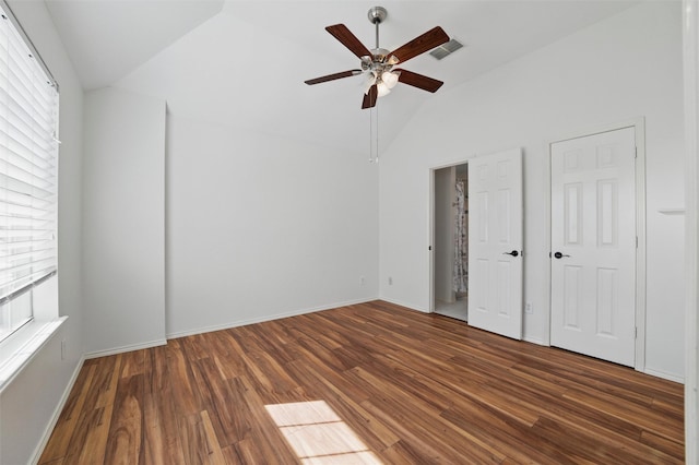 6500 High Brook Dr, Fort Worth, TX 76132 - unfurnished bedroom featuring multiple windows, vaulted ceiling, visible vents, and wood finished floors