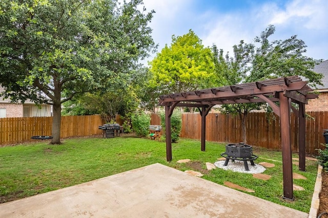 view of patio / terrace featuring an outdoor fire pit, area for grilling, a fenced backyard, and a pergola