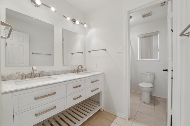 6500 High Brook Dr, Fort Worth, TX 76132 - full bathroom with tile patterned floors, visible vents, double vanity, and a sink