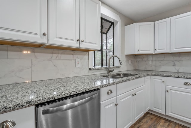 kitchen featuring dark wood-type flooring, white cabinetry, dishwasher, and a sink