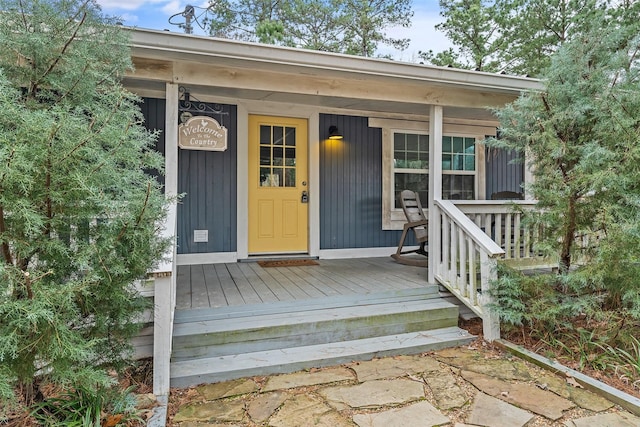 entrance to property with a porch