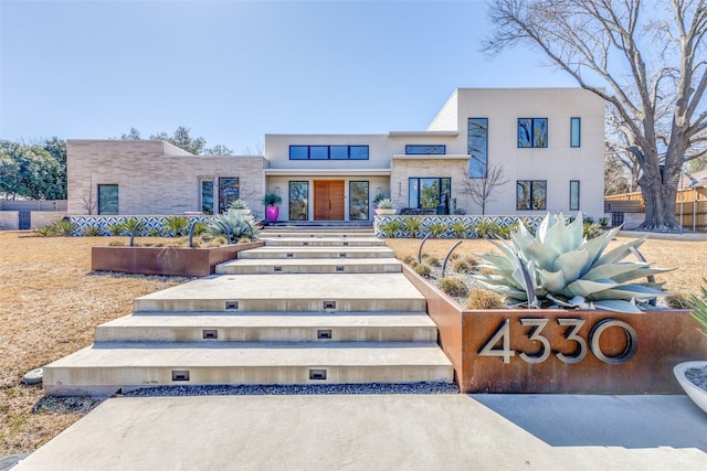 modern home with stucco siding