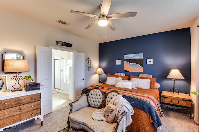 bedroom featuring ceiling fan, visible vents, and light colored carpet