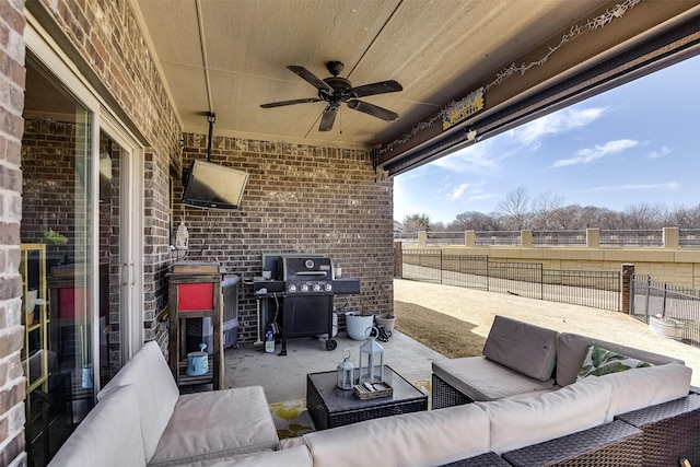 view of patio / terrace with an outdoor living space, grilling area, a fenced backyard, and a ceiling fan