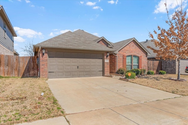 single story home with driveway, a garage, a shingled roof, fence, and brick siding