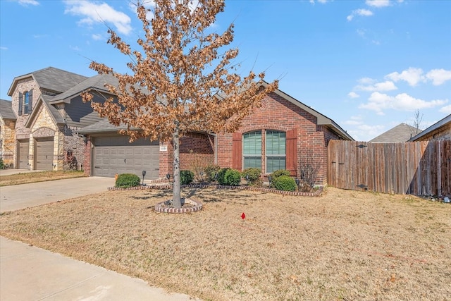 view of front of property with brick siding, fence, a garage, stone siding, and driveway