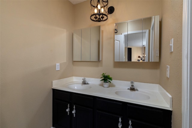 full bathroom featuring double vanity and a sink