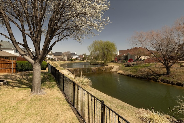 view of water feature featuring fence