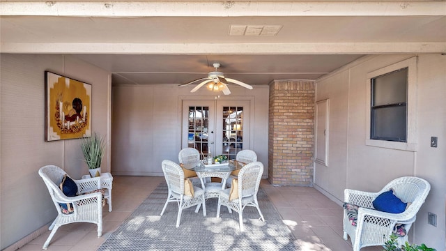 interior space featuring ceiling fan, visible vents, outdoor dining area, and french doors