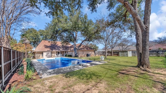 view of swimming pool featuring fence, a fenced in pool, and a yard