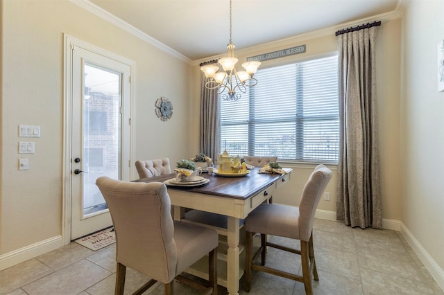 dining room with baseboards, ornamental molding, light tile patterned floors, and a notable chandelier