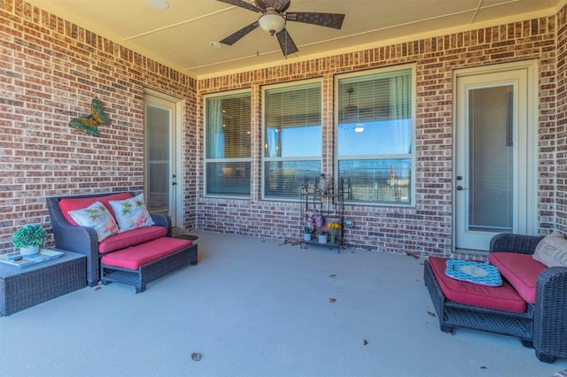 view of patio featuring a ceiling fan