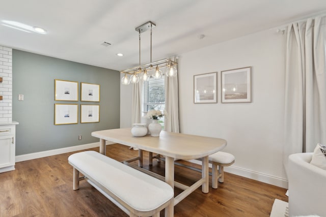 dining area with visible vents, baseboards, wood finished floors, and recessed lighting