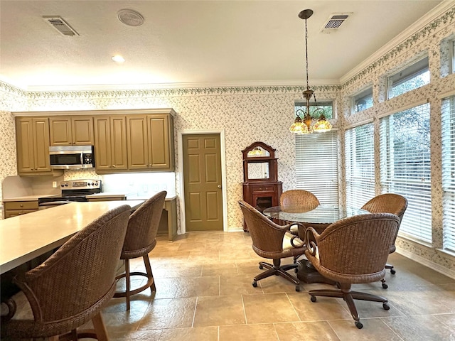 dining space with wallpapered walls, plenty of natural light, baseboards, visible vents, and crown molding