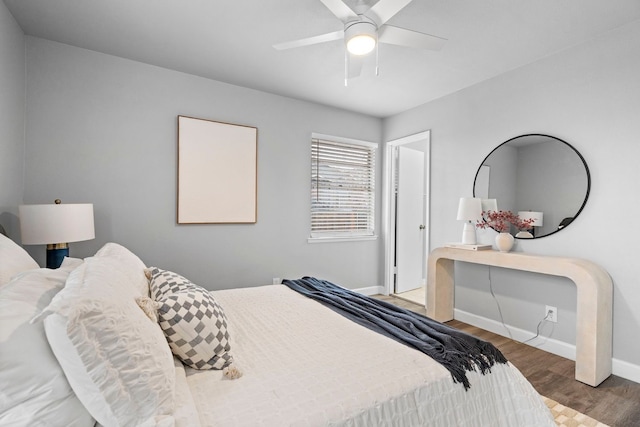 9723 Queenswood Ln, Dallas, TX 75238 - bedroom featuring baseboards, wood finished floors, and ceiling fan