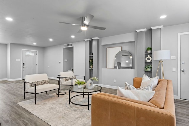 9723 Queenswood Ln, Dallas, TX 75238 - living room with wood finished floors, visible vents, recessed lighting, and ceiling fan