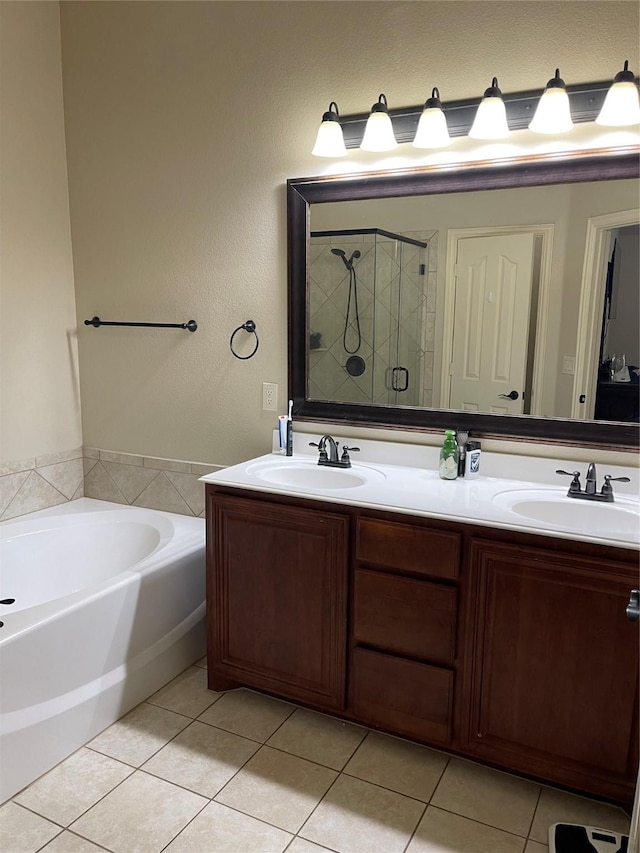 312 Salisbury Dr, Anna, TX 75409 - bathroom featuring tile patterned flooring, a shower stall, double vanity, and a garden tub