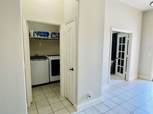 312 Salisbury Dr, Anna, TX 75409 - laundry room featuring separate washer and dryer and light tile patterned flooring
