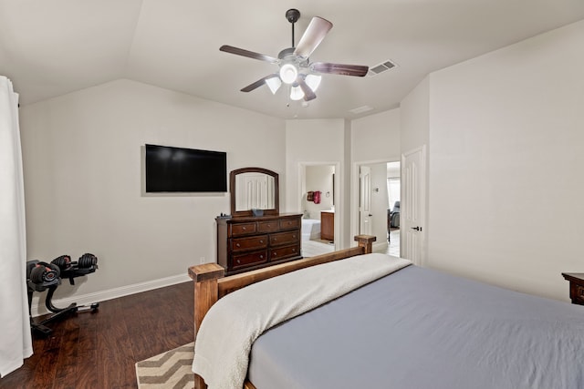 bedroom with baseboards, visible vents, a ceiling fan, lofted ceiling, and wood finished floors