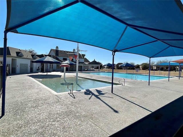 312 Salisbury Dr, Anna, TX 75409 - community pool featuring a patio area and a residential view