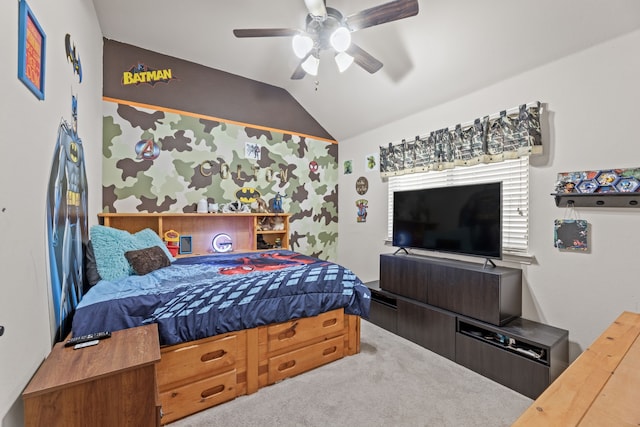 carpeted bedroom with lofted ceiling and a ceiling fan