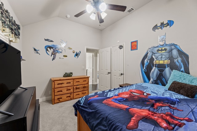 bedroom with carpet flooring, visible vents, a ceiling fan, vaulted ceiling, and baseboards