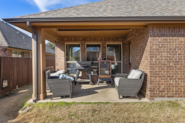 view of patio / terrace featuring fence and an outdoor living space