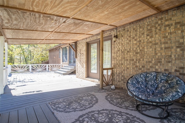 wooden deck featuring entry steps