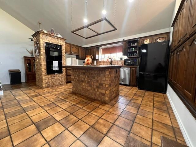 kitchen featuring a center island, freestanding refrigerator, dark brown cabinets, stainless steel dishwasher, and light tile patterned flooring