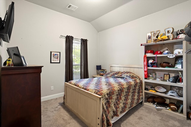 bedroom featuring light carpet, baseboards, visible vents, and vaulted ceiling