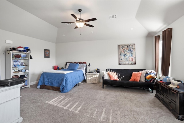 bedroom with light carpet, ceiling fan, visible vents, and vaulted ceiling