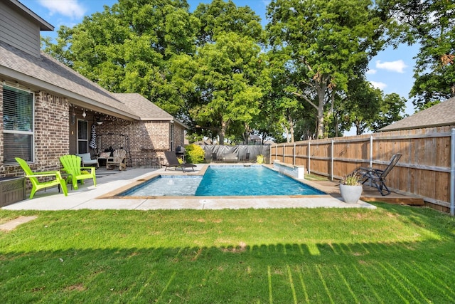 view of pool featuring a lawn, a patio area, a fenced backyard, and a fenced in pool