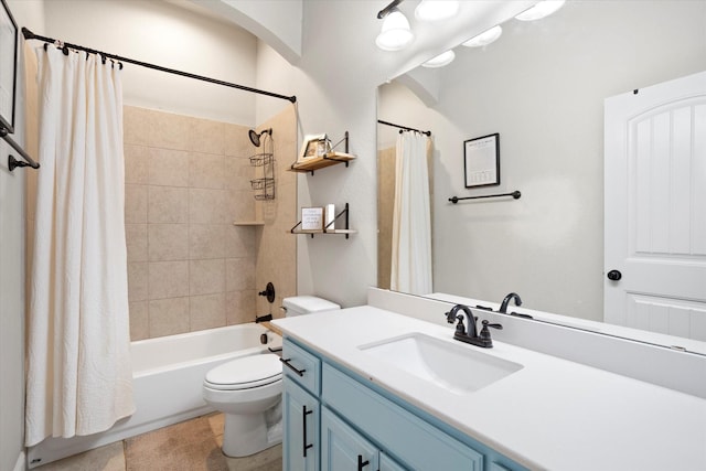 bathroom with toilet, shower / bath combo, and vanity