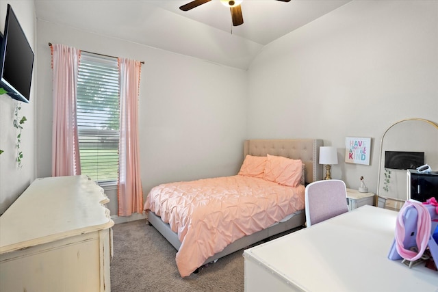 bedroom with a ceiling fan, lofted ceiling, light colored carpet, and multiple windows