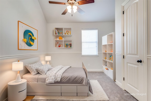 7721 Lake Worth Cv, Mckinney, TX 75071 - bedroom with carpet flooring, baseboards, vaulted ceiling, and a ceiling fan