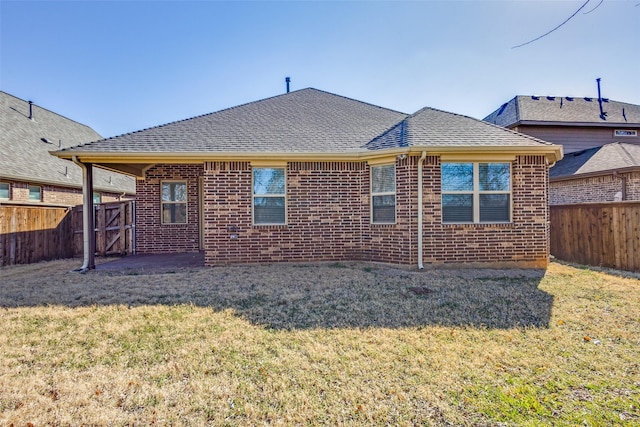 7721 Lake Worth Cv, Mckinney, TX 75071 - rear view of house with brick siding and a shingled roof