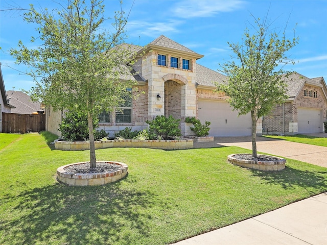 view of front facade with a shingled roof, concrete driveway, an attached garage, stone siding, and a front lawn