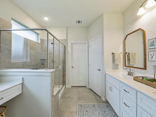 full bathroom featuring recessed lighting, vanity, visible vents, a shower stall, and tile patterned floors