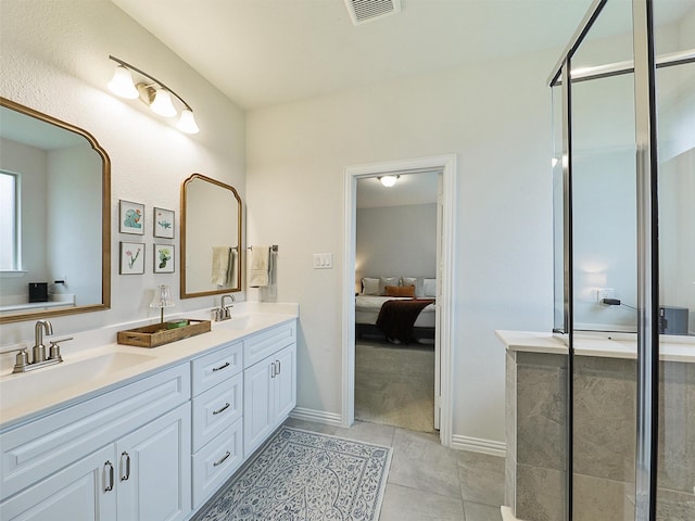 ensuite bathroom featuring a stall shower, visible vents, a sink, and double vanity