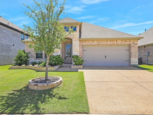 view of front of home featuring an attached garage, concrete driveway, stone siding, roof with shingles, and a front lawn