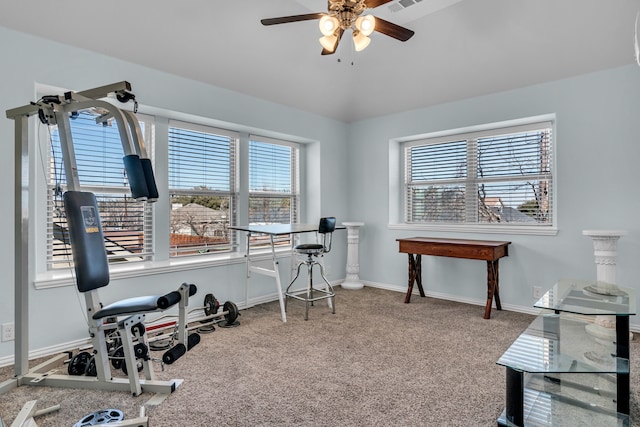 exercise room featuring visible vents, carpet, a ceiling fan, and baseboards