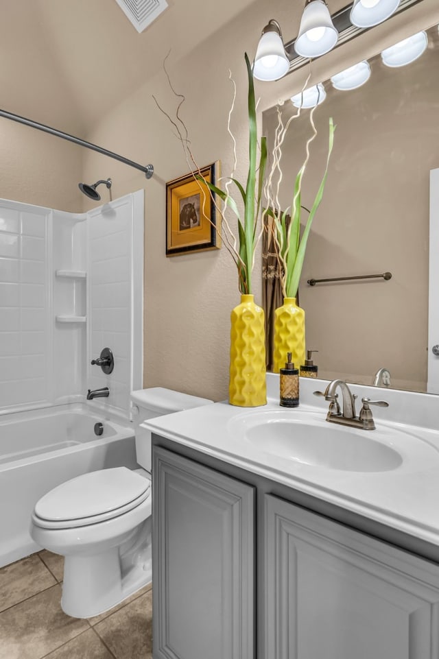 full bathroom featuring visible vents, toilet, tub / shower combination, vanity, and tile patterned flooring