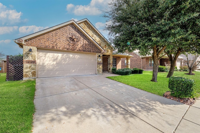 ranch-style house featuring a garage, a front yard, stone siding, and brick siding