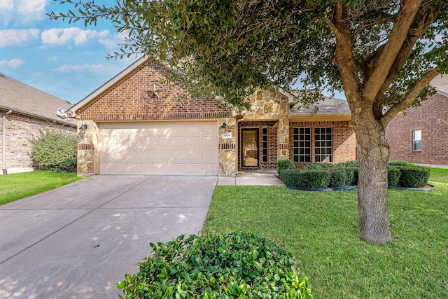 view of front of property with a front lawn, concrete driveway, brick siding, and an attached garage