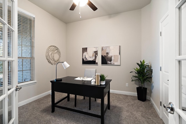 carpeted office with french doors, ceiling fan, and baseboards