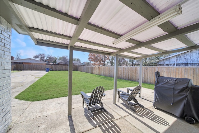 view of patio with a fenced backyard and area for grilling