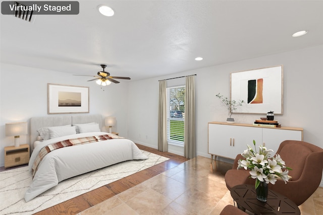 bedroom featuring baseboards, a ceiling fan, and recessed lighting