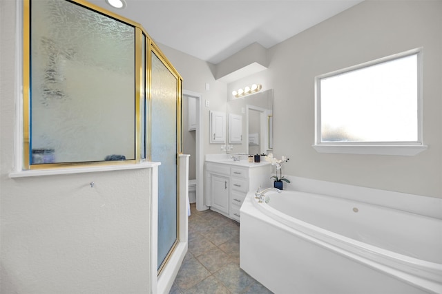 full bath featuring toilet, vanity, a shower stall, tile patterned flooring, and a bath