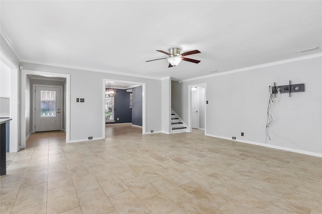 unfurnished living room featuring ceiling fan with notable chandelier, crown molding, baseboards, and stairs